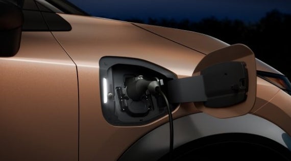 Close-up image of charging cable plugged in | Sansone Nissan in Woodbridge NJ